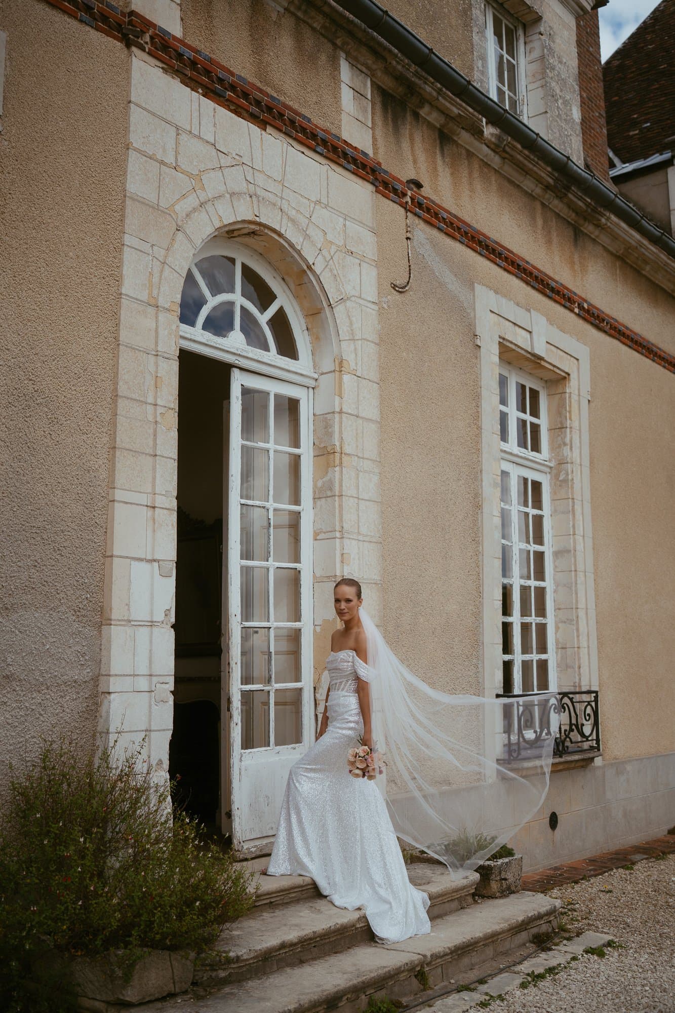 Couple at their chateau wedding in France