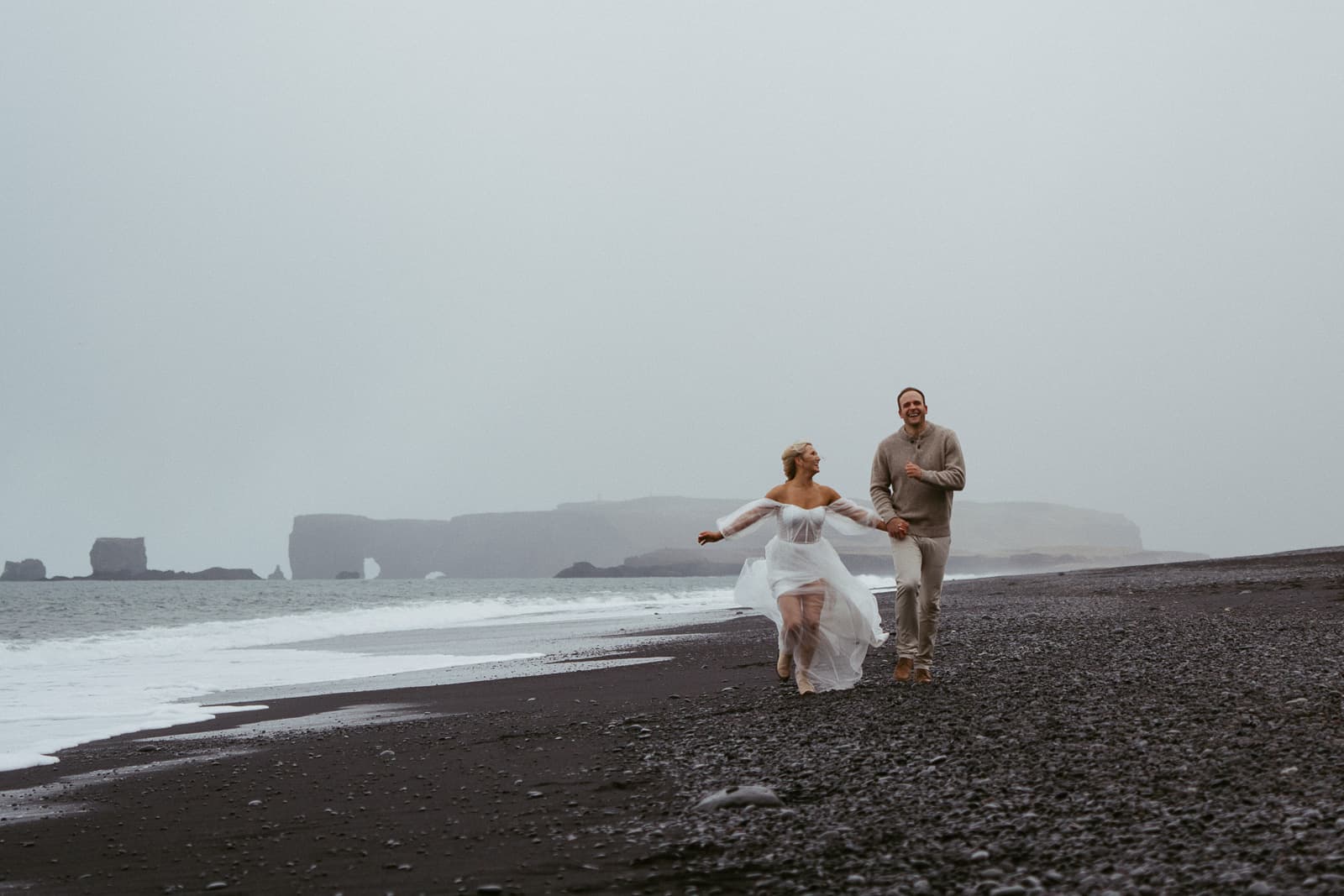 Iceland Engagement Photos: From Black Sand Beach to a Snowy Waterfall
