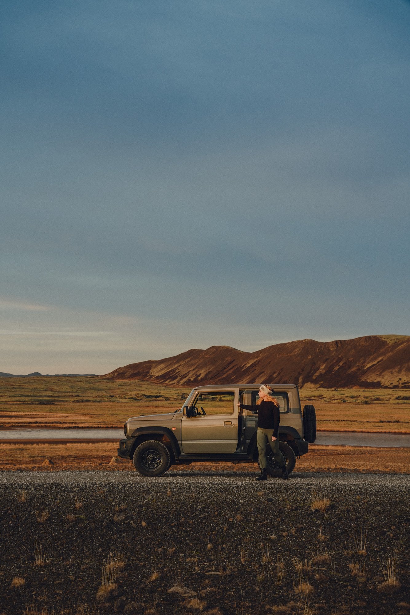 The family car parked in the Icelandic highlands at dusk
