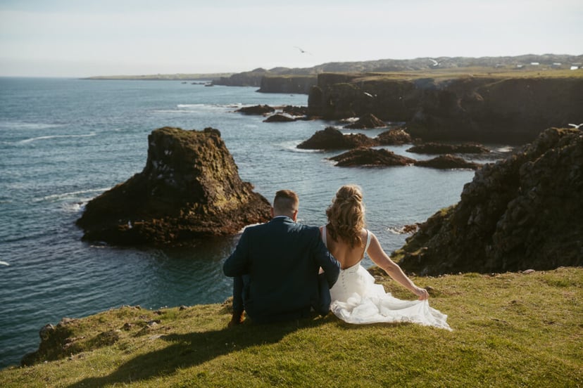 Arnarstapi cliffs couple photo during adventure wedding in Iceland
