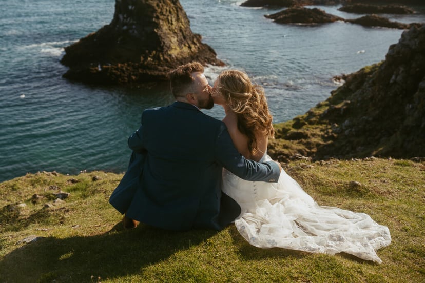 Arnarstapi cliffs couple photo during adventure wedding in Iceland
