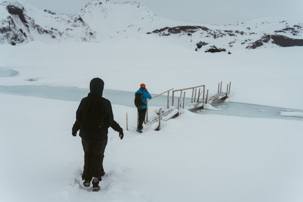 Winter couple photos inside a glacier cave in Iceland