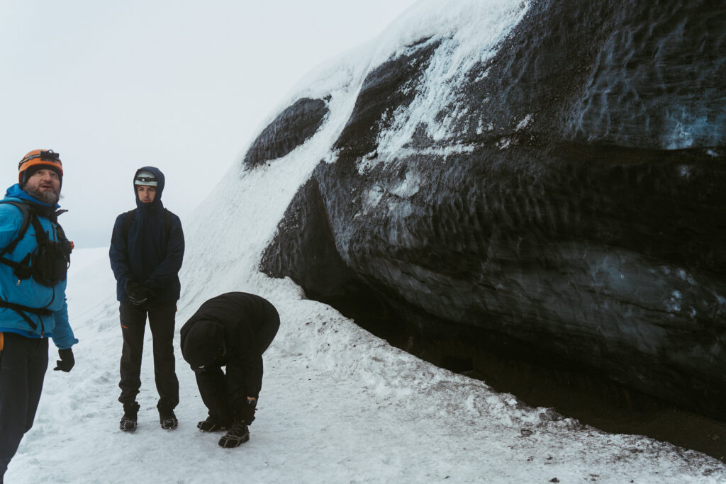 Winter couple photos inside a glacier cave in Iceland