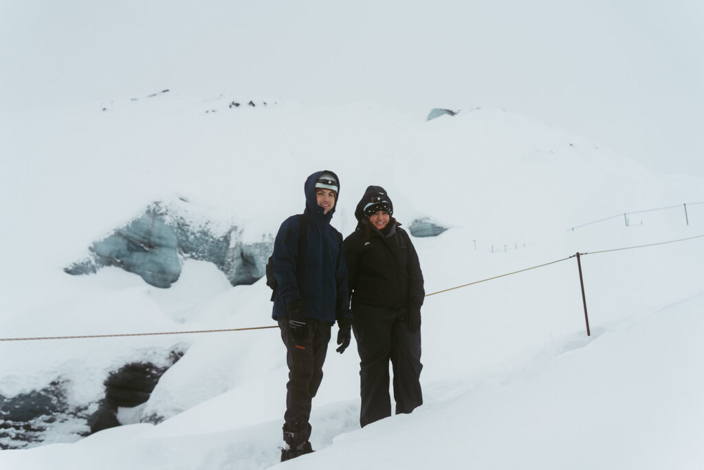 Winter couple photos inside a glacier cave in Iceland