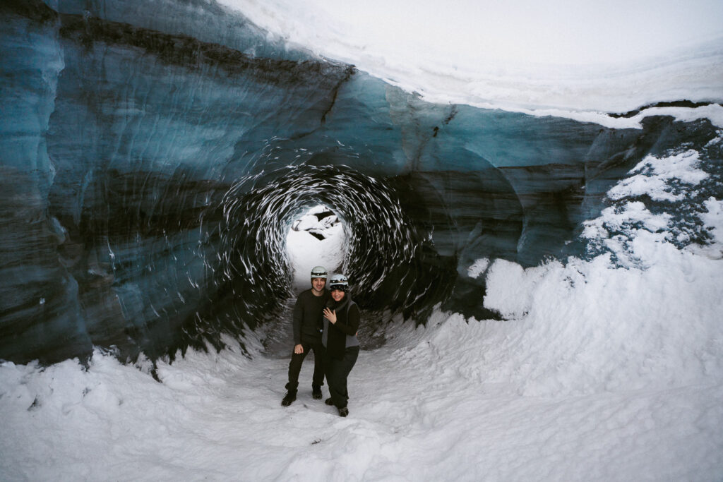 Winter couple photos inside a glacier cave in Iceland