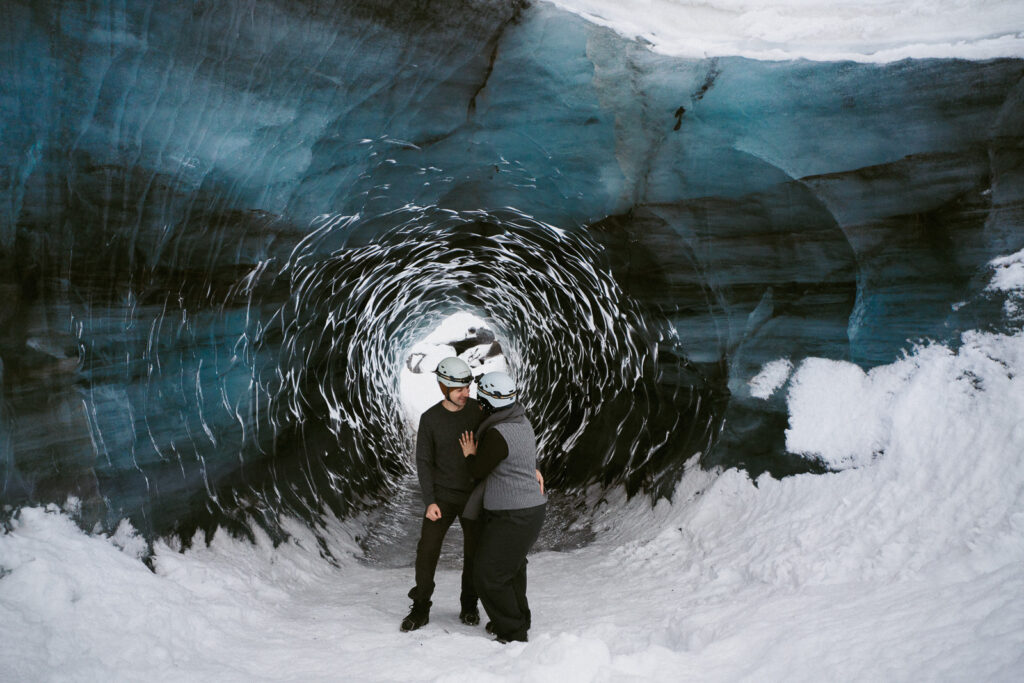 Winter couple photos inside a glacier cave in Iceland