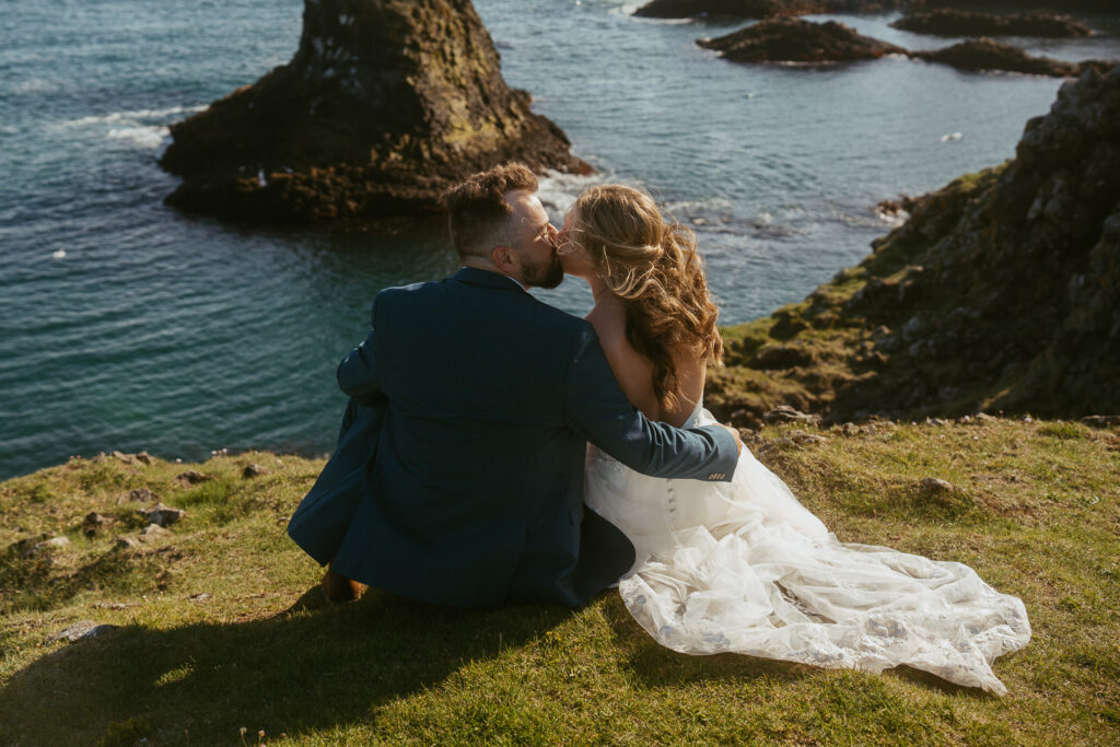 Arnarstapi cliffs couple photo during adventure wedding in Iceland