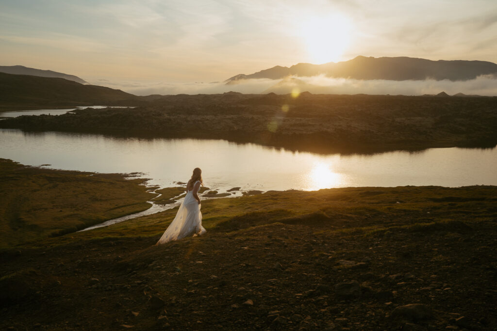 Romantic wedding photo at Selvallafoss waterfall in West Iceland