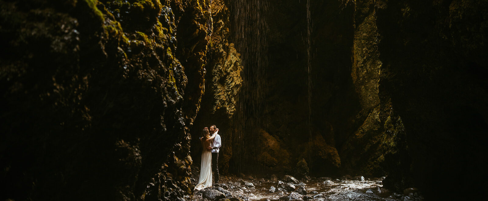 Romantic engagement photo at mossy canyon in South Iceland